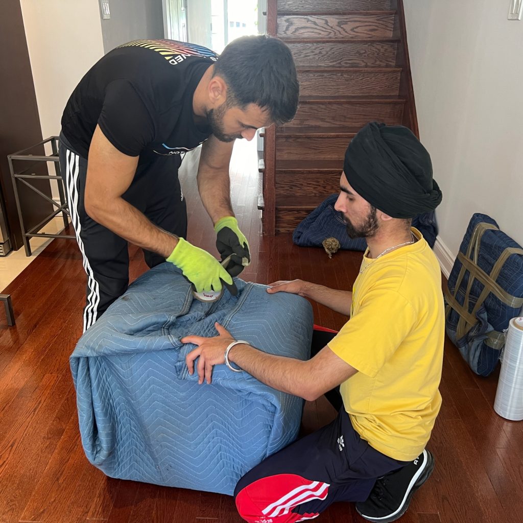 moving men packing box