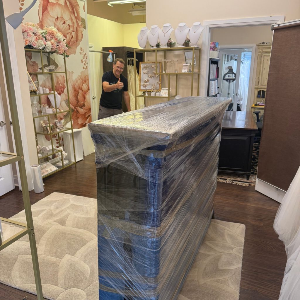 commercial moving services packing in a retail store