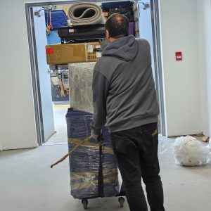 mover bringing boxes to climate controlled storage unit