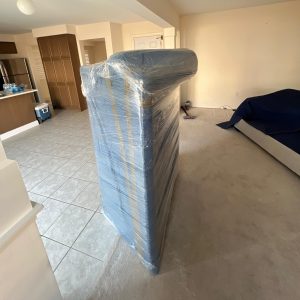 couch wrapped for furniture moving