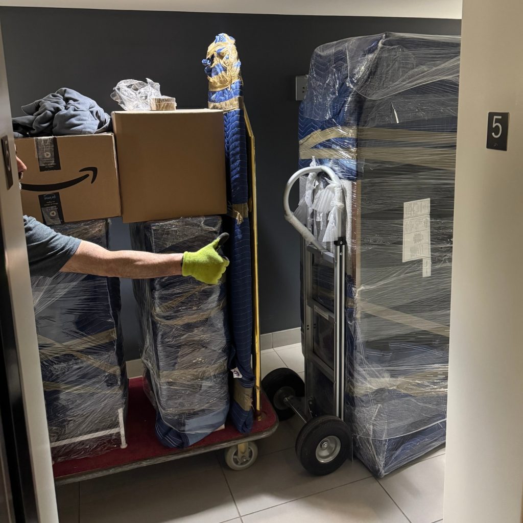 condo moving company in elevator