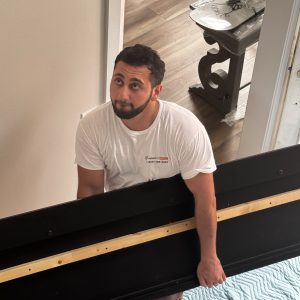 furniture mover bringing furniture upstairs