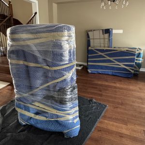 movers packed up furniture in a home