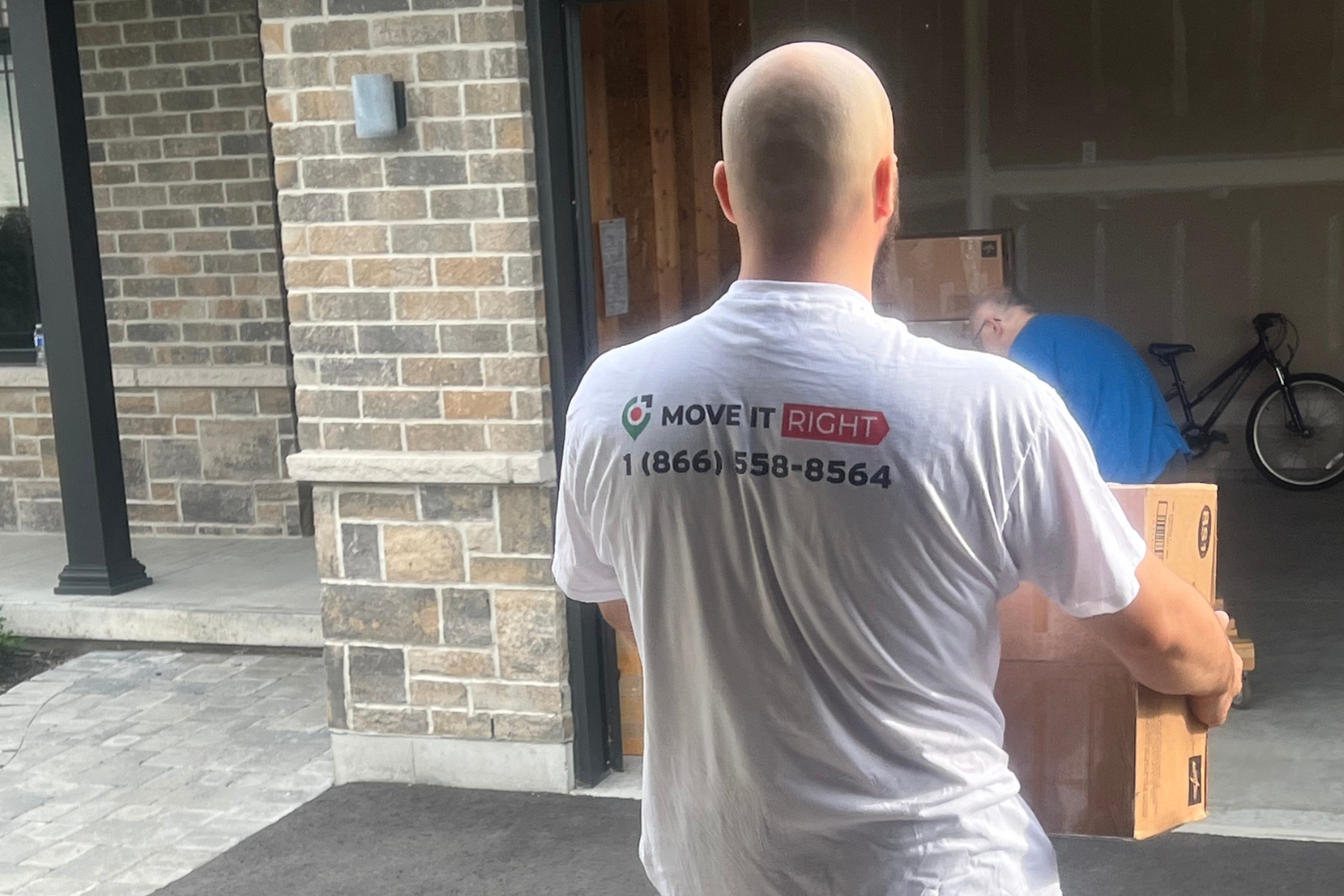 movers in the GTA unloading into a new home