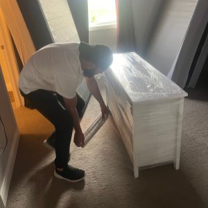 burlington movers wrapping up furniture