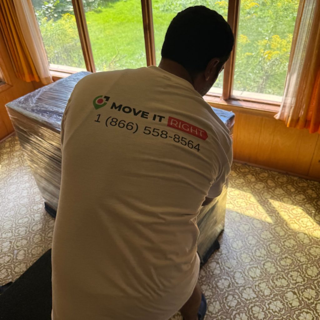 movers putting furniture in cottage