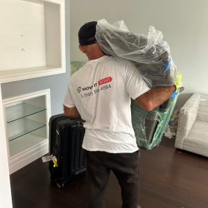 movers carrying furniture