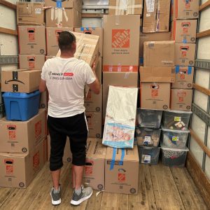 moving services burlington organizing boxes in truck