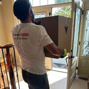 moving company taking furniture out of cottage home