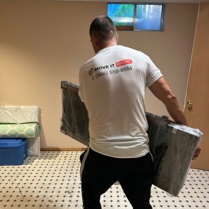 ajax movers lifting furniture