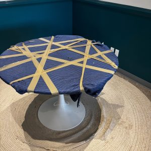 school desk wrapped with padding for moving