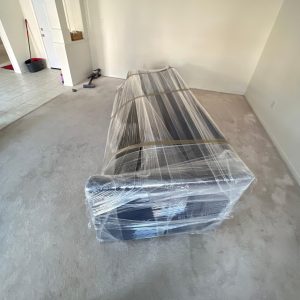 movers wrapped couch