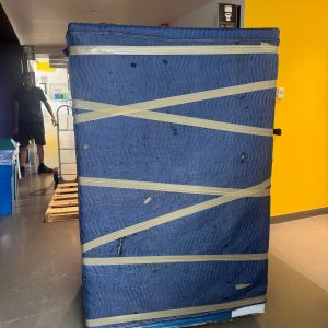 large office relocation with packed furniture
