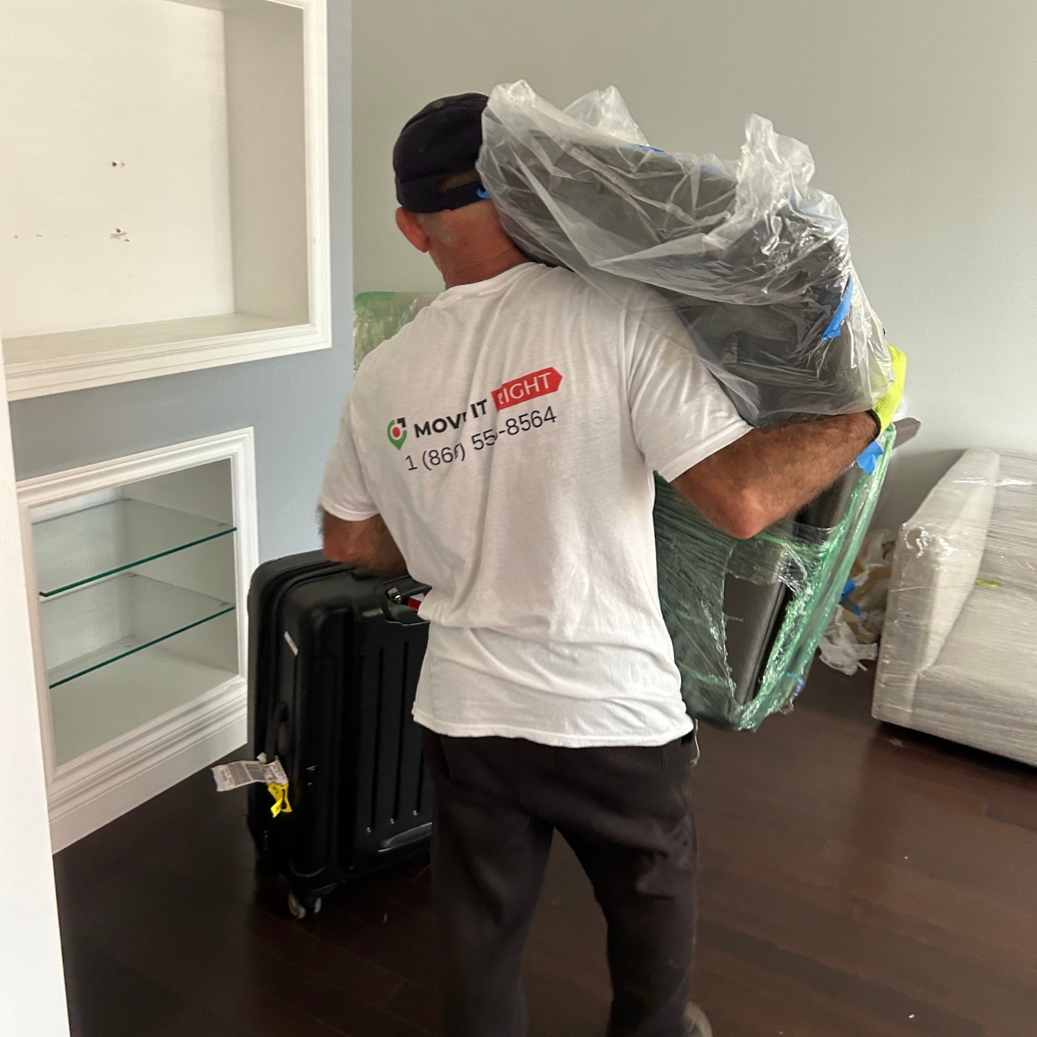 mover carrying office chair for a office move