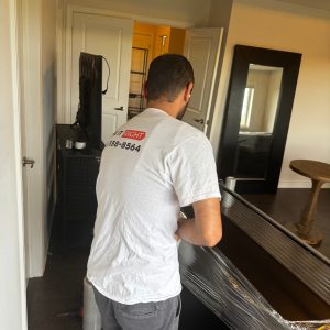 movers wrapping premium luxury furniture