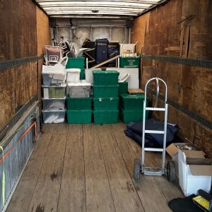 school boxes packed in a moving truck