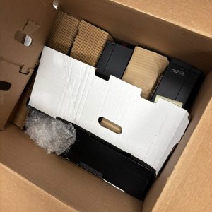 electronics from it office move packed into a box