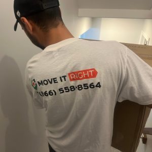mover taking box downstairs