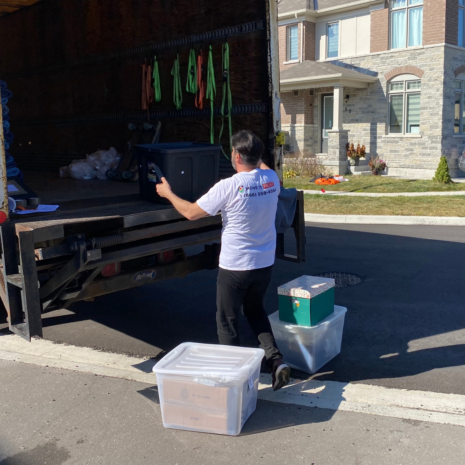 mover loading truck with furniture