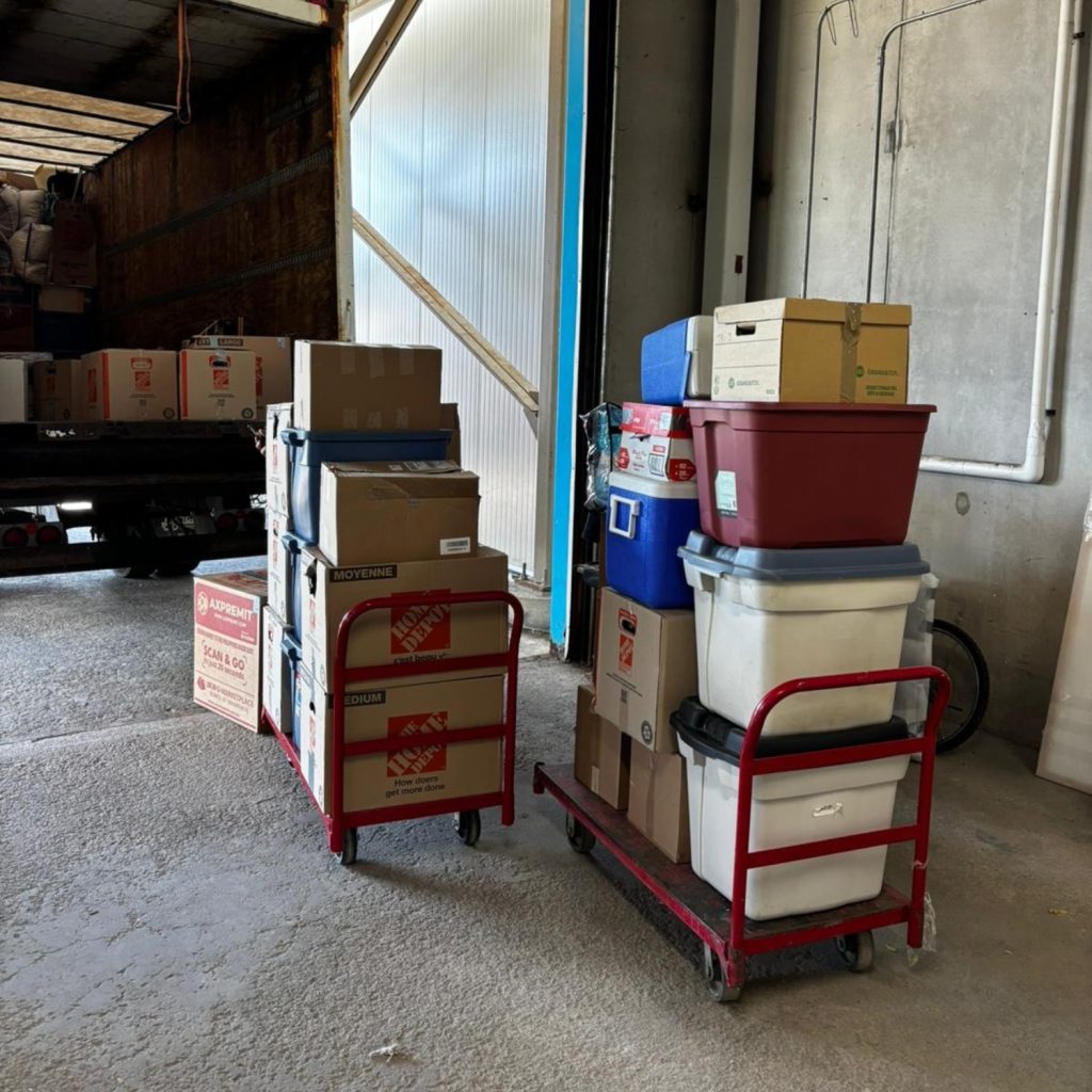 boxes stacked on trolleys